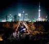 (c) Nicolas Henry. Wang Xiao, Shanghai, avec sa pelle sur le chantier d'un immeuble