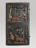 Porte fon du palais d'Abomey. Signification mal connue de l'ensemble du décor, qui doit comporter des allusions aux symboles et à l'histoire de la royauté (c) musée du quai Branly, photo Michel Urtado, Thierry Ollivier